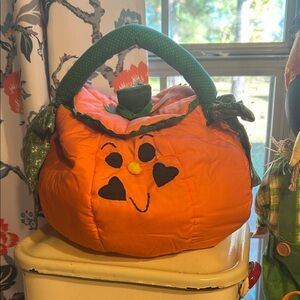 Vintage homemade pumpkin bucket/basket    Good condition.  Only spot near nose